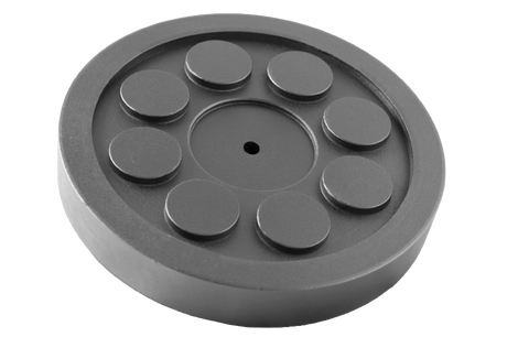 Front view of a black, round rubber pad (item no. 335160-GS5.0) for vehicle lifts, with central hole, rubber lip for slipping over, and bolting to the lift arm.