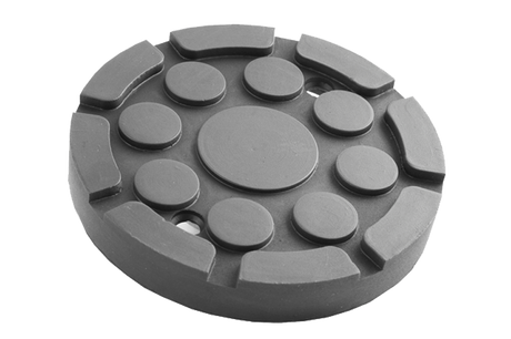 Front view of a black, round rubber pad (item no. 36001.04.04.001) for vehicle lifts, with two holes, rubber lip for slipping over, and bolting to the lift arm.