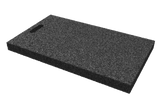 Angled view of the black, rectangular leveling pad AP-TVS.680.400.H50 for wheel alignment lifts, made of compressed rubber material with a porous surface and a grip hole.