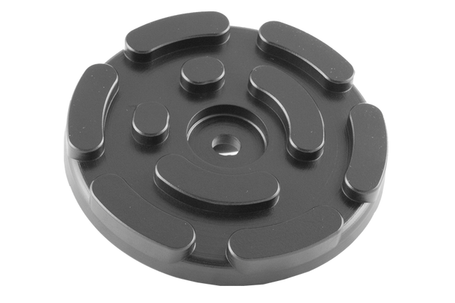 Front view of item GTCN008, a round black rubber pad with a central hole for bolting onto the lifting plate.