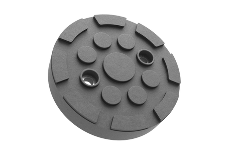 Front view of the black, round rubber pad GTCN010 for vehicle lifts with two holes for secure bolting to the lift arm.